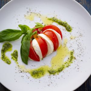 Mozzarella and tomato caprese basil sauce