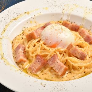 Soft-boiled egg carbonara with white truffle flavor