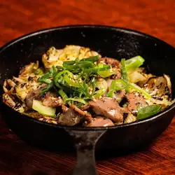 Grilled Daisen chicken rind on a hot plate