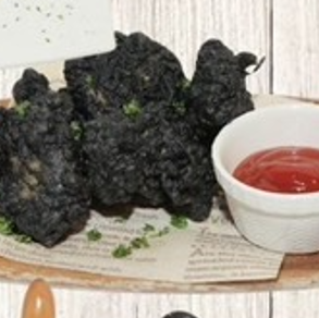 Fried whelk and green seaweed
