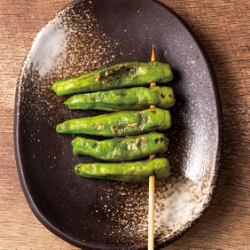 Grilled shishito pepper skewers