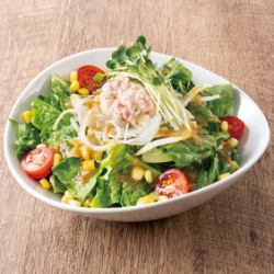 A heart-melting salad of colorful vegetables and organic ginger dressing