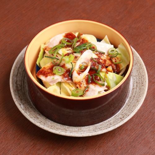 Steamed pork in bamboo steamer with fragrant soy sauce
