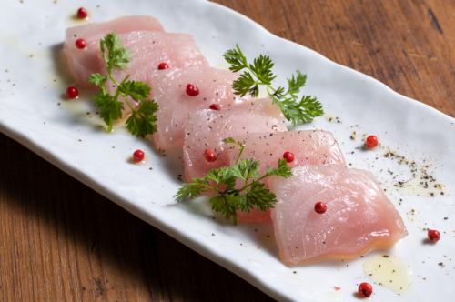 Tuna marinated in herb oil