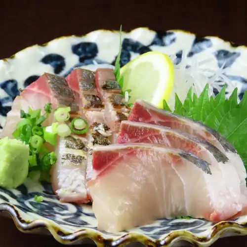 Two types of striped jack: sashimi and seared sashimi