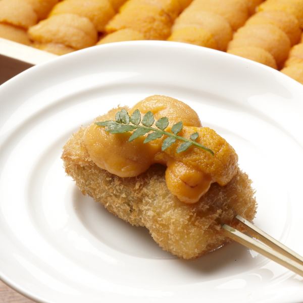 Raw sea urchin on special skewer cutlet and Kochimochi kelp