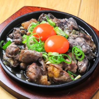知覧鶏のもも焼き鉄板(大 300g蘭王乗せ)
