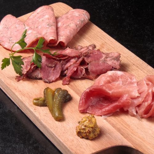 Assorted cured ham and salami