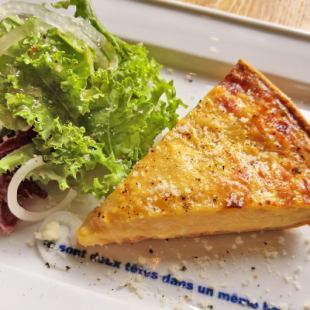 Caramelized onion and raclette cheese quiche