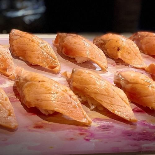 Grilled salmon nigiri