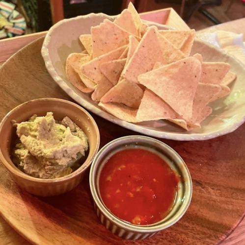 Tortilla chips with various sauces