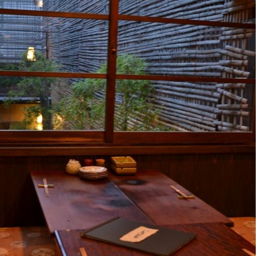 A tatami room on the 2nd floor.Green bamboo outside the window.