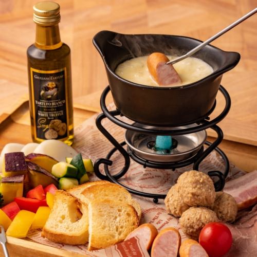 Truffle-scented meat and vegetable cheese fondue