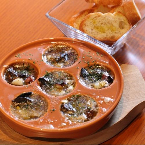 Escargot, scallops and octopus garlic butter oven grilled with herbs