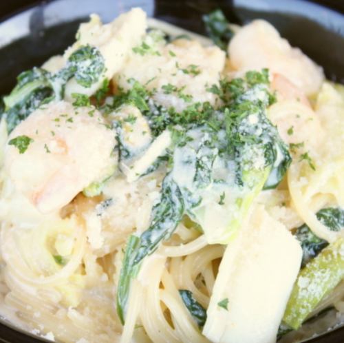 Mentaiko cream spaghetti with shrimp, squid and seasonal vegetables