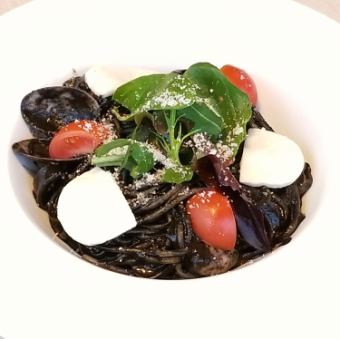 Black spaghetti with seafood and squid ink