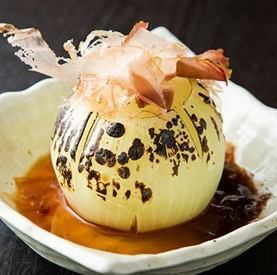 Whole onion with bonito flakes and ponzu sauce