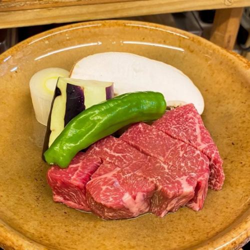 Grilled Shimane Wagyu beef on a ceramic plate