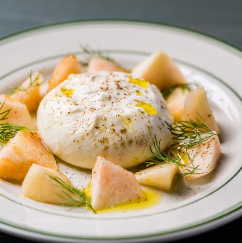 Burrata cheese and seasonal fruit caprese