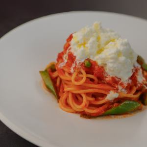 Pasta with fresh burrata cheese and tomato sauce