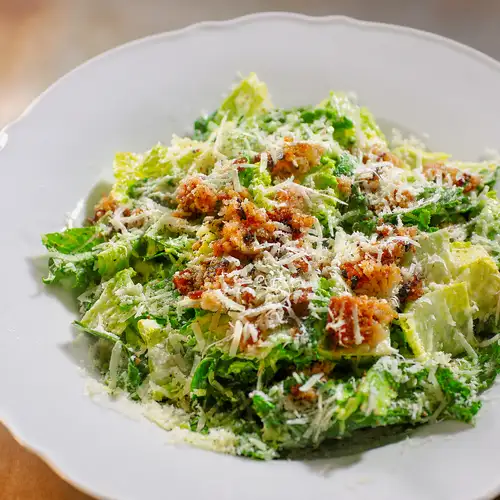 Romaine lettuce and kale Caesar salad