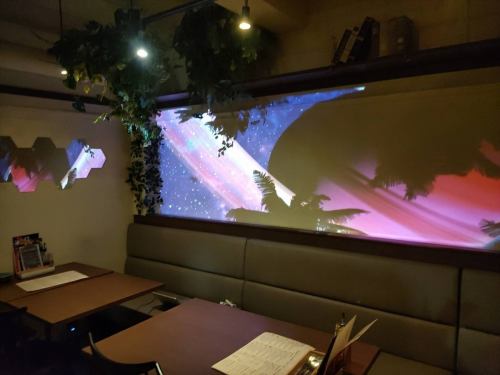 A special space decorated with visuals and music that weaves together a unique world view.