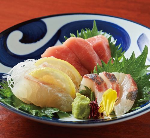 Assortment of three fresh fish sashimi
