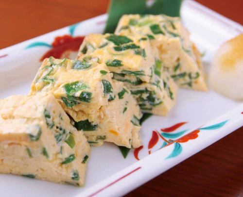 Rolled egg with green onion