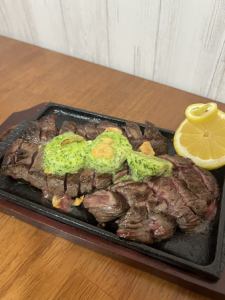 Lean beef steak with herb garlic butter
