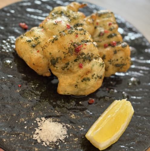 Fried conger eel with basil sauce