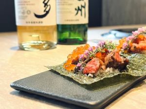 Grilled wagyu beef and salmon roe hand roll