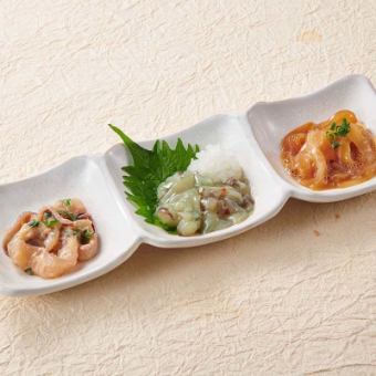 Assortment of three seafood delicacies