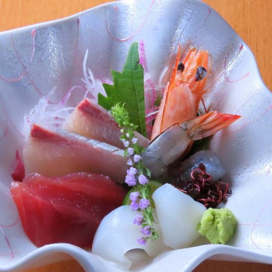 Enjoy fresh seafood and local sake.