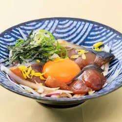 Marinated fatty mackerel with egg on top