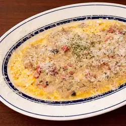 Homemade mushroom omelet with porcini sauce
