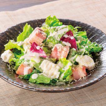 Caesar salad with "chunky bacon and cheese"