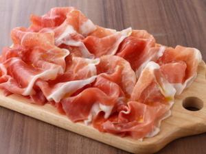 Freshly cut prosciutto crudo