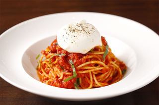 Spaghetti with burrata cheese and tomato sauce