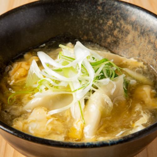 Warm dumplings and egg soup