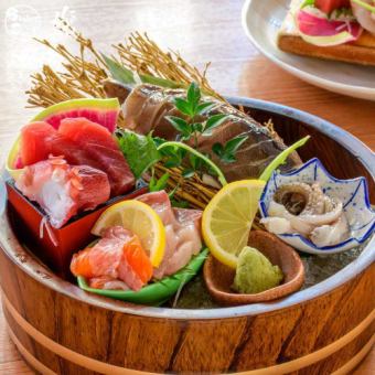 Young fish sashimi and a platter of fresh seasonal fish sashimi.