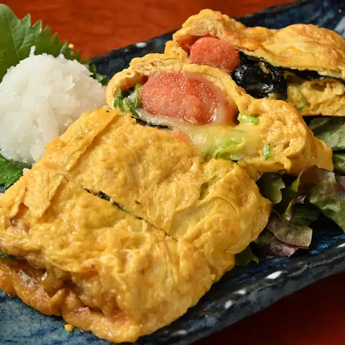 ふんわり玉子と旨みたっぷりポークが織りなす満足感抜群の厚焼玉子仕立て