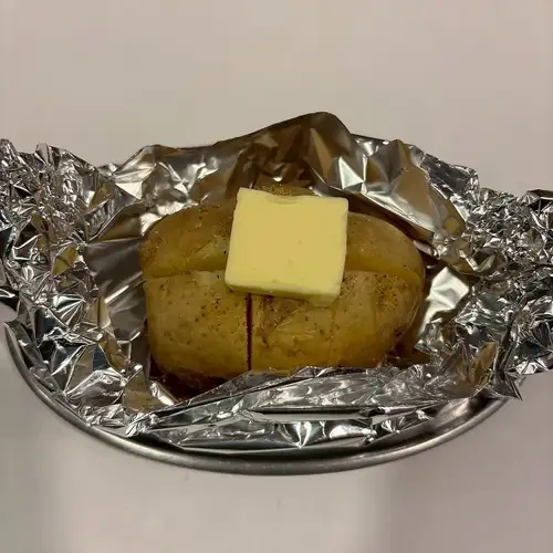 Potato with butter / Garlic baked in foil