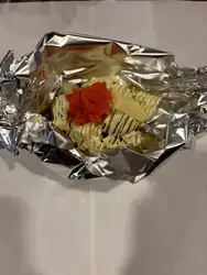 Potato with butter, mentaiko (spicy cod roe), and cheese.