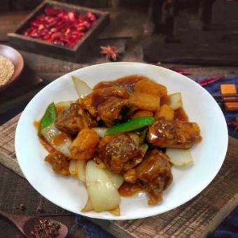 Spareribs and vegetables with sweet and sour sauce