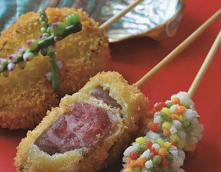 A 16-course omakase (chef's choice) menu featuring a comparison of A5-grade beef fillet and Japanese Black beef fillet skewers, with a welcome drink included.