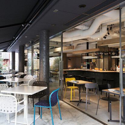 The semi-private room, separated by a curtain, can accommodate up to 16 people. Reservations are required.