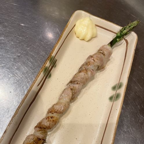 Asparagus wrapped in pork