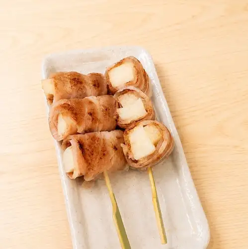 Pork skewers wrapped around Japanese yam (2 skewers)