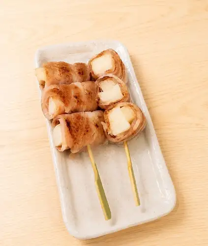 Pork skewers wrapped around Japanese yam (2 skewers)