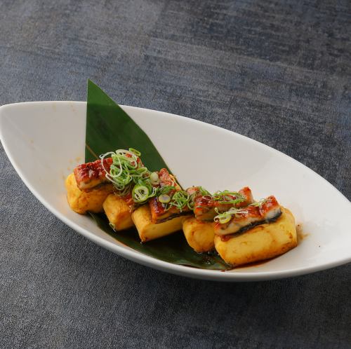 Eel topped with rolled egg